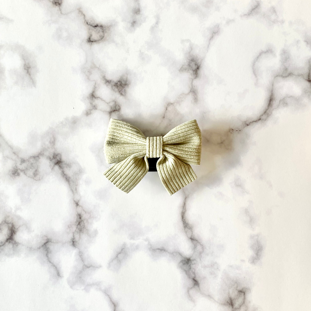 minimalist sage green corduroy puppy bowtie with velcro enclosure